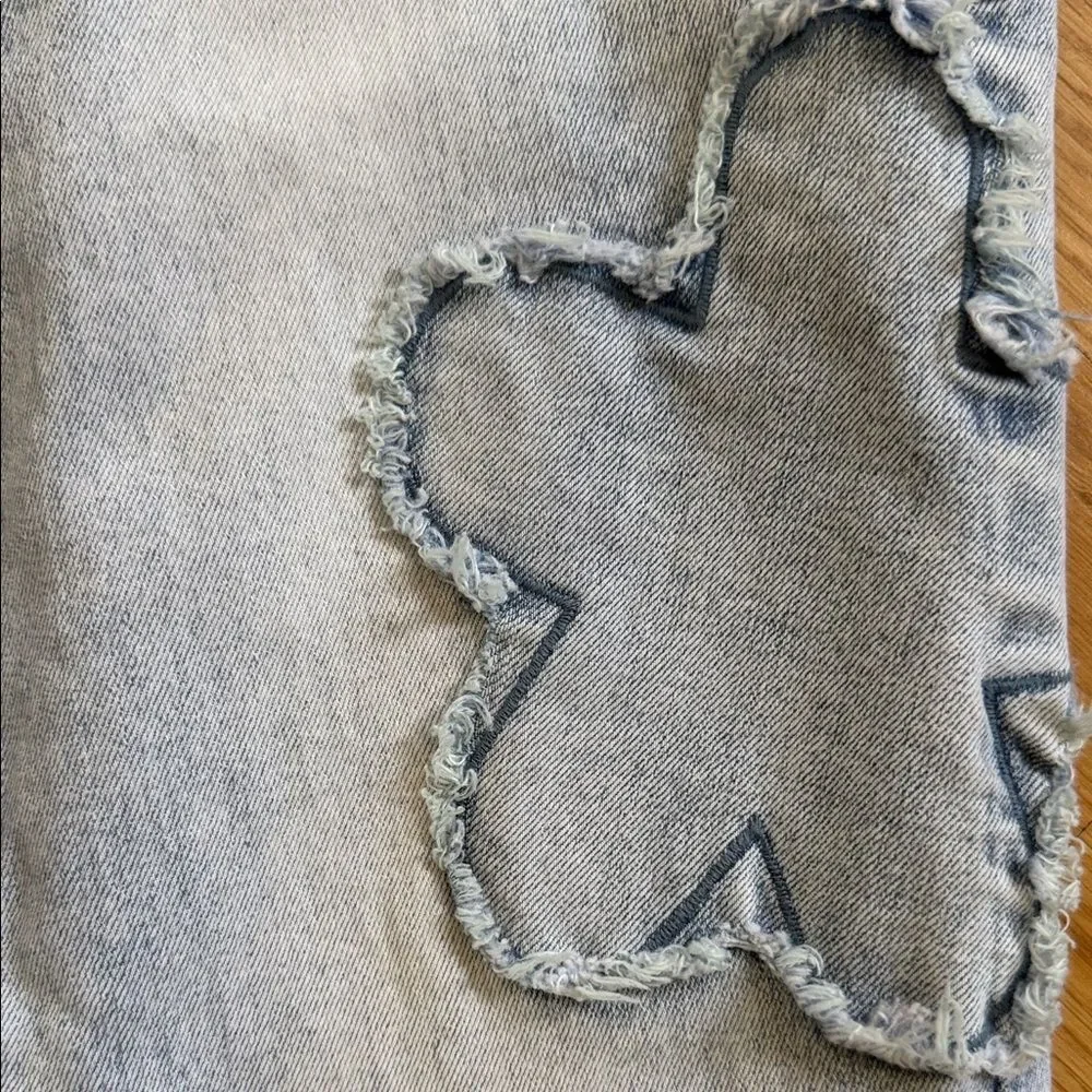 Stylish Light Blue Women's Jeans with Floral Accents Size 0 or 24 Flare Leg
